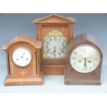 Early 20thC oak cased wall clock with stylised Arabic numerals and two train movement, 58cm tall,