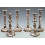 Set of four silver plated candlesticks, height 30cm together with a further pair of candlesticks