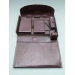 Parkins & Cottu, Oxford St. tooled leather gilt metal mounted travelling desk set with pockets,