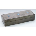Arts & Crafts pewter box set with five blue cabochons, length 31cm