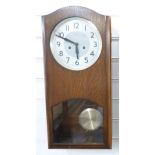 Two-train Art Nouveau style wall clock with bold Arabic numerals, 58cm tall