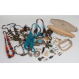 A collection of costume jewellery including faux pearls, necklaces, brooches etc