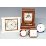 Seth Thomas Connecticut 19th century mantel alarm clock together with three mid twentieth examples