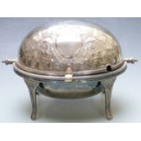 A silver plated food warmer with revolving lid, engraved decoration and two vacant cartouches,