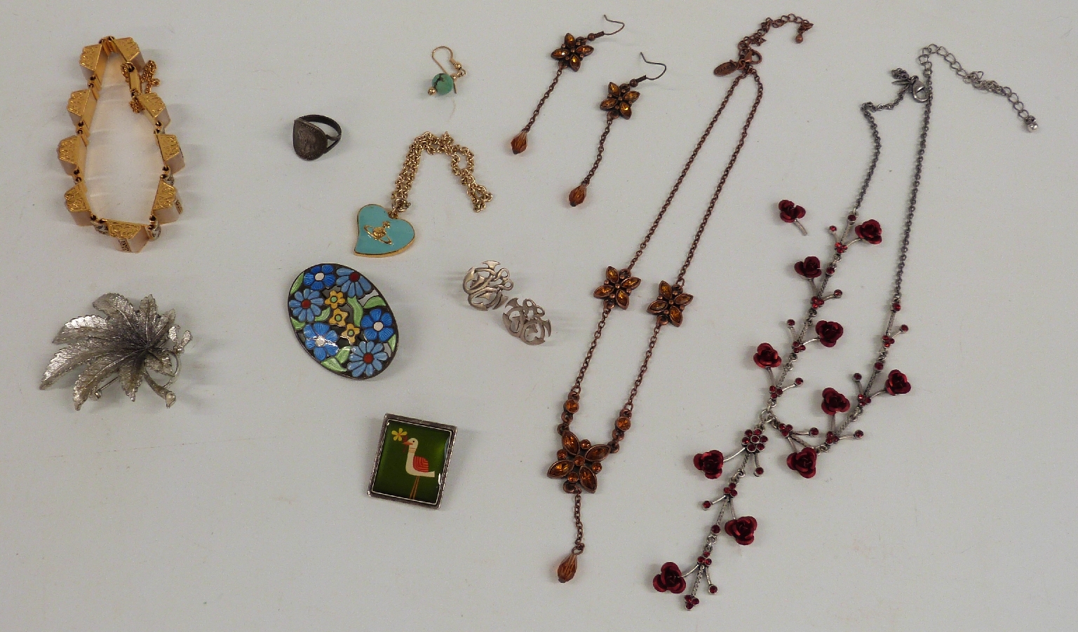 A collection of costume jewellery including a silver and enamel brooch, Exquisite brooch, silver - Image 3 of 4