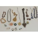 A collection of jewellery including rose quartz brooch, agate necklace, micro mosaic bracelet, paste