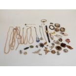 A collection of jewellery, brooches including Victorian swivel, Victorian knot, saphiret, silver