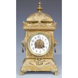Japy Freres late 19thC brass mantel clock in ornate brass case with lion masked cherub decoration,
