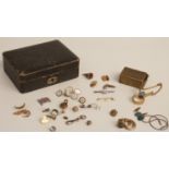 An 18ct gold cufflink (5.5g), 9ct gold brooch (1.2g), two sections of Victorian rings (3.2g), a pair