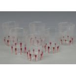 Twelve Giampolo Nason Murano drinking glasses with red decoration, in original boxes