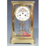 Marti of France late 19thC brass mantel clock in corniche style case, the Roman enamelled dial