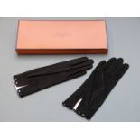 Hermes ladies gloves in fine black suede leather with cutout trim, unused, in original box