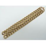 A 14k gold bracelet made up of interlocking links, 73.5g