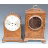 Two wooden mantel clock cases, tallest 40cm, both raised on bracket feet