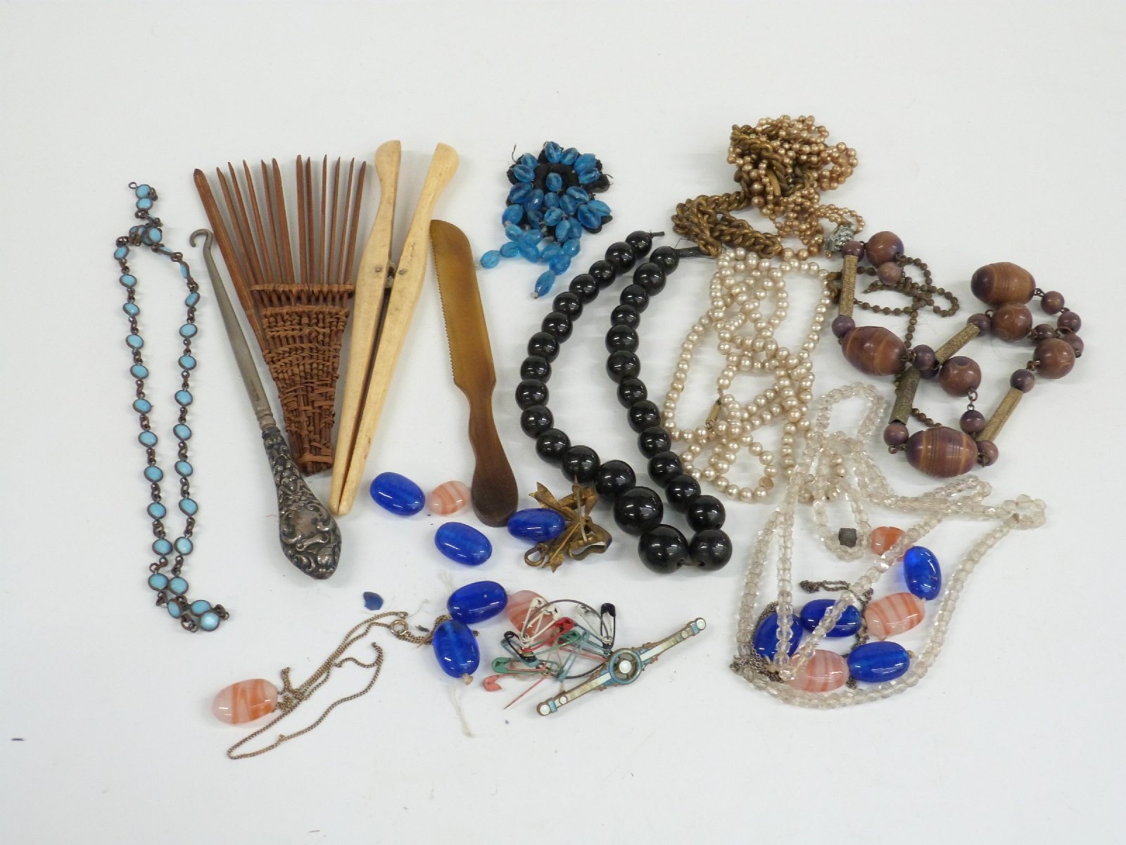 A collection of costume jewellery including beads, brooches, watches, silver handled button hook, - Image 4 of 7
