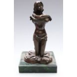 Ellis bronze of a semi nude kneeling lady removing her top, height 24cm