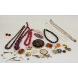 A collection of costume jewellery including two silver brooches, Stratton compact, enamel brooch,