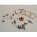 A collection of jewellery, brooches including Sarah Coventry, bangles, silver rings etc