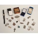 A collection of silver jewellery including earrings, two ingots, watch, two fobs, filigree brooch,