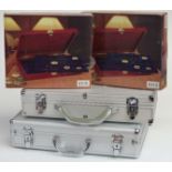 Four coin collector's cases including two flight style examples