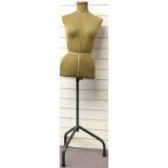 A vintage tailor's dummy raised on a green metal stand, height 144cm