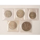 1935 George V 'rocking horse' crown, F+ together with a 1928 florin and three George VI coins,