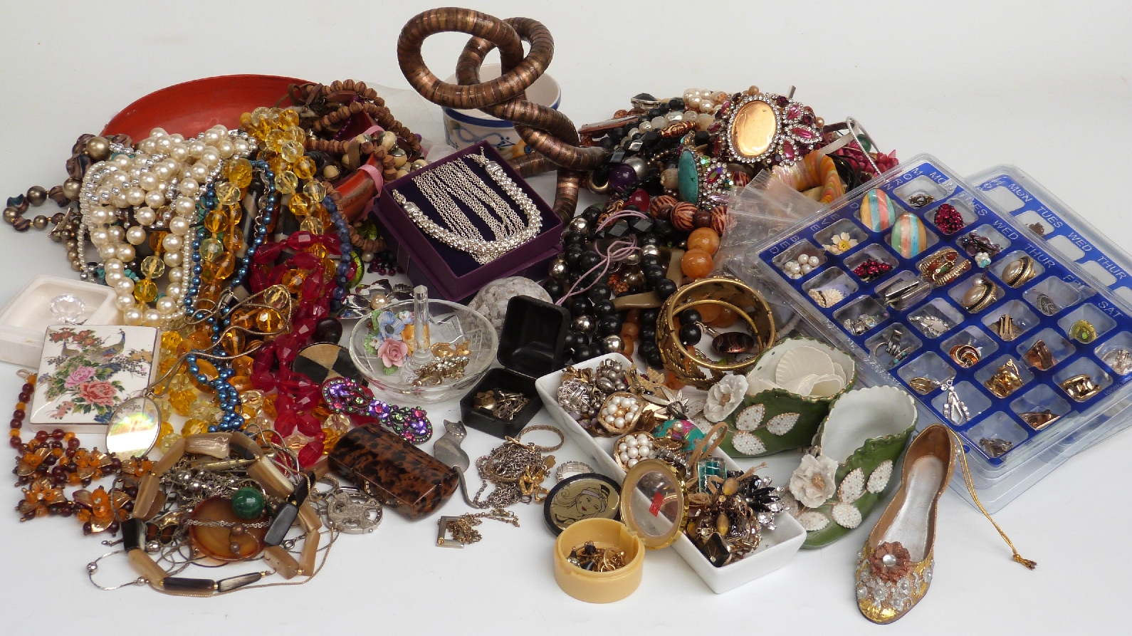 A collection of costume jewellery including crystal beaded necklaces, necklaces, earrings, Coro