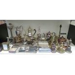 A quantity of silver plated and other metalware to include oil lamp base with reeded column and