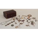 A collection of costume jewellery including silver necklaces, silver ring, filigree cross pendant,