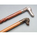 Two walking canes with novelty dog handles