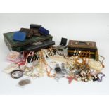 A collection of costume jewellery including beaded necklaces, earrings, brooches etc