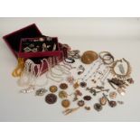 A collection of costume jewellery including necklaces, brooches, a filigree brooches etc