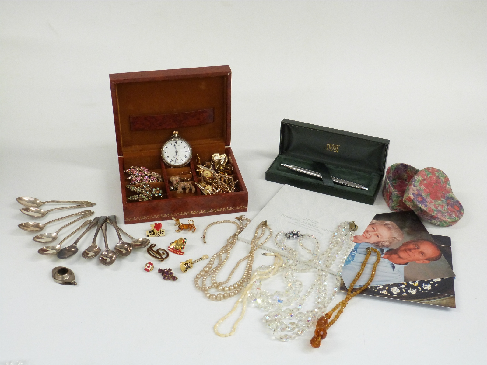 A collection of costume jewellery including necklaces, silver plate spoons, cross, cufflinks, 9ct