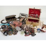 A collection of costume jewellery including beads, marcasite brooch, bracelets, vintage and diamanté