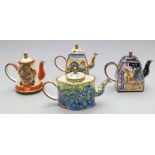 Four enamelled copper miniature teapots decorated with flowers and birds after Van Gogh