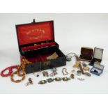A collection of costume jewellery including filigree earrings, watches, a Victorian silver brooch in