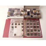 A large collection of world coinage mostly in two indexed 'Coinstor' collectors' lidded trays,