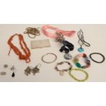 A collection of jewellery including pearl bracelet, Victorian chain, coral necklace, silver rattle