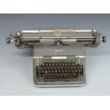 Olympia typewriter and guillotine paper cutter