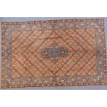 Persian fine wool/silk wall hanging with central blue flower design, interlocking floral surround