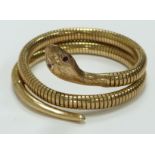A 9ct gold snake bracelet set with ruby eyes, Birmingham 1978