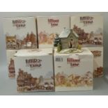 Eight Lilliput Lane models in boxes