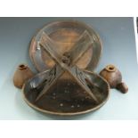 Carved African treen bowls, folding stool and two vessels, diameter of bowls 48cm