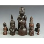 A collection of African hardwood figures, tallest 29cm