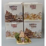 Eight Lilliput Lane models in boxes