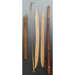 A carved wooden club, Maori reproduction paddle and inlaid abalone staff, riding crop etc