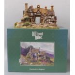 Three Lilliput Lane models in boxes including The Kings Arms, Anne of Cleves and Anne Hathaway