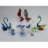 Thirteen Wedgwood, Murano and similar glass paperweights and sculptures all in the form of