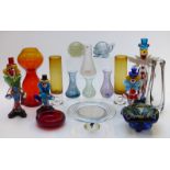 Sixteen pieces of coloured glassware including four Murano clowns, Vicke Lindstrad Contour vase,