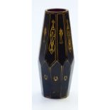 A faceted amethyst glass vase with gilt decoration, 15.5cm tall